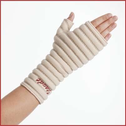 Sie sehen eine Packung Staudt Handgelenk-Manschetten, Produktbild: 01 Staudt Handgelenk-Manschetten, A-Nr.: 1449245 - 01