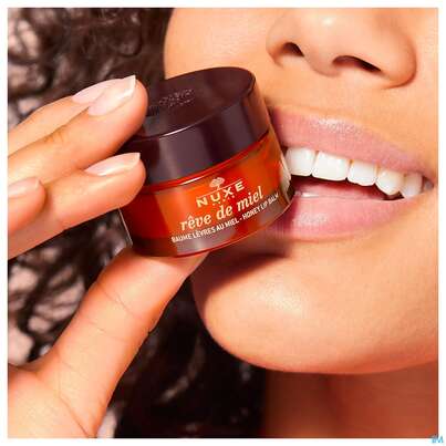 Sie sehen eine Packung Nuxe Reve De Miel Baume Levres 15g, Produktbild: 13 Nuxe Reve De Miel Baume Levres 15g, A-Nr.: 4080378 - 13